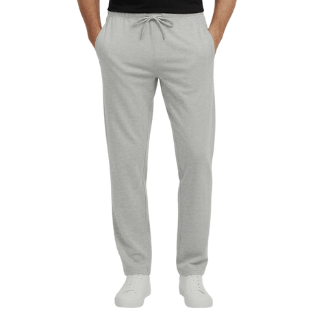 Pantalon de jogging gris avec cordon de serrage à la taille et poches zippées, vu de face sur une personne