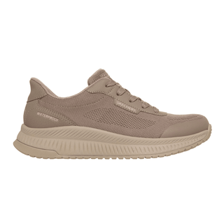Chaussure Skechers slip-in outdoor femme couleur sable, vue latérale, avec logo "Skechers" et texte "Waterproof"