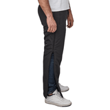 Vue latérale d'un pantalon thermique Dobsom noir avec la fermeture éclair intégrale partiellement ouverte